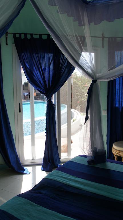 Hotel Le Clos Des Papillons Saly Portudal Ruang foto