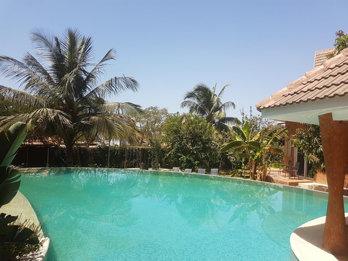 Hotel Le Clos Des Papillons Saly Portudal Bagian luar foto