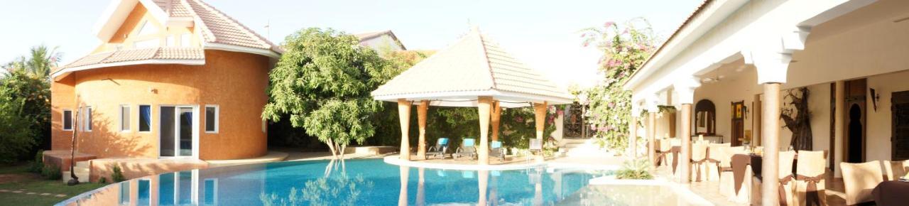 Hotel Le Clos Des Papillons Saly Portudal Bagian luar foto